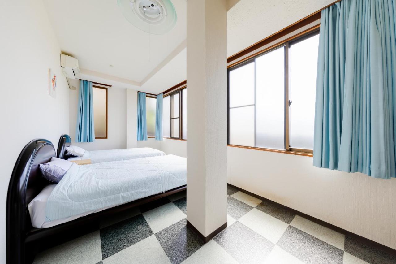 Yolee Guest House Идзумисано Экстерьер фото